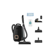 Black vacuum cleaner with attachments on a white background