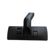 Black vacuum cleaner head on a light gray background