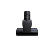 Black vacuum attachment on a light gray background