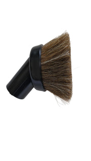 Black brush with brown bristles on a white background