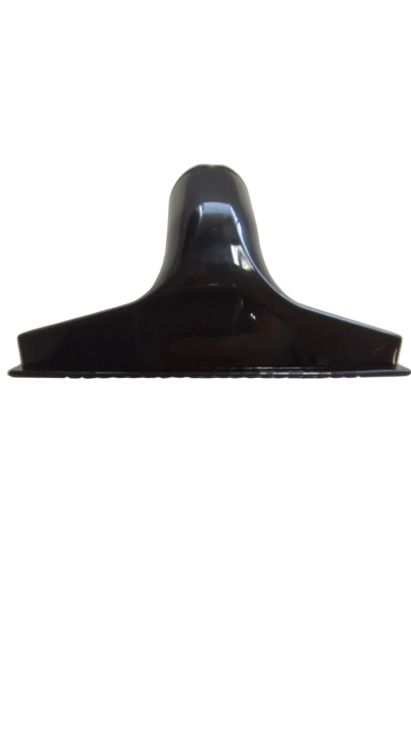 Black plastic component on a white background
